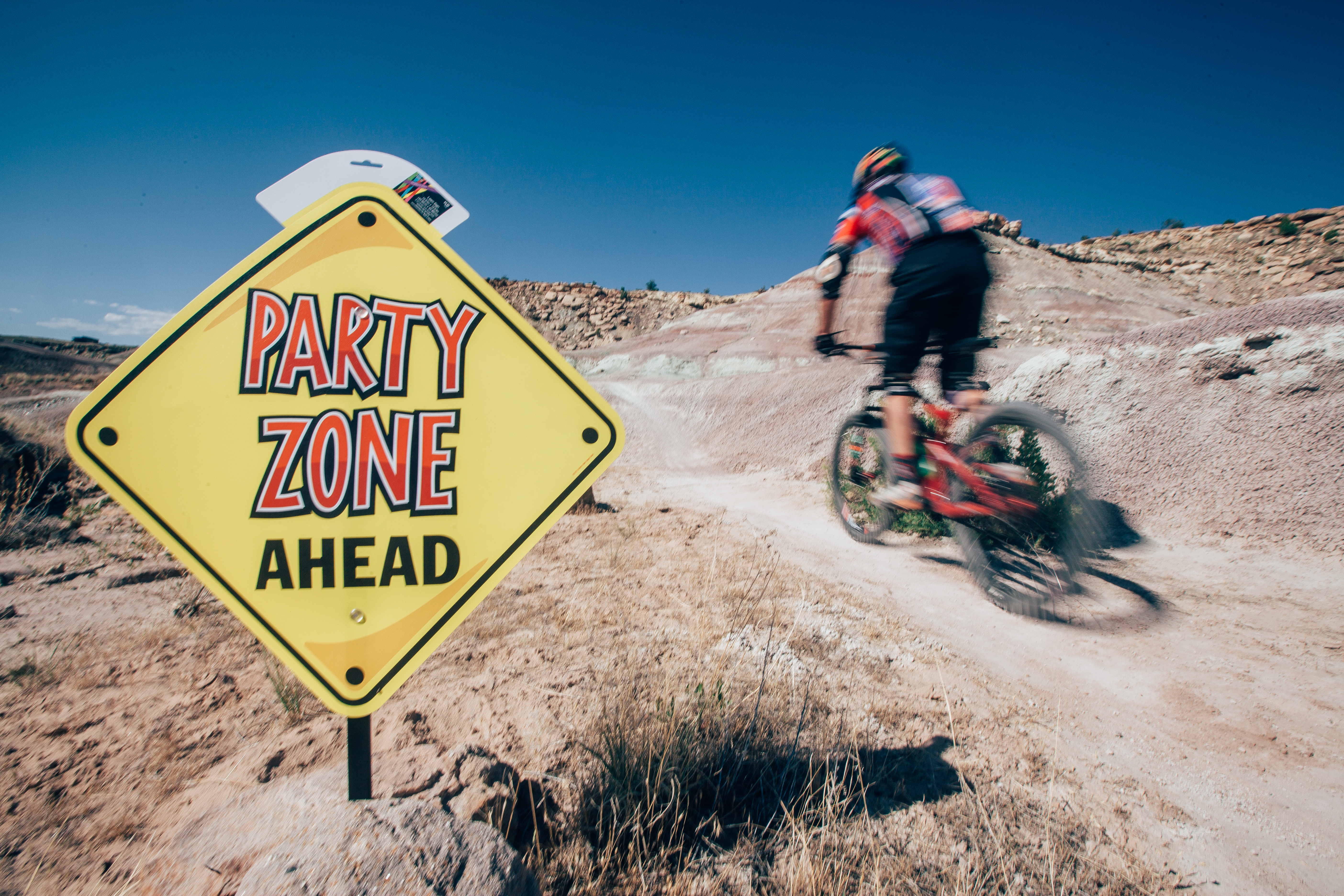 A sign marked "Party Zone" marks the Grand Enduro trail.